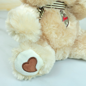 URSO DE PELUCIA DE POLIESTER COM LAÇO 25CM - FE6918-BG